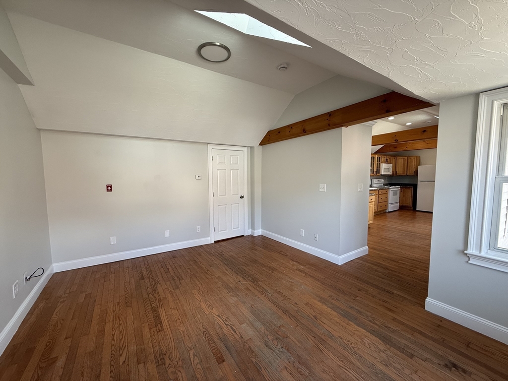 3 Mill Street Shirley, MA 01464 - Photo 7 of 27 an empty room with wooden floor and closet