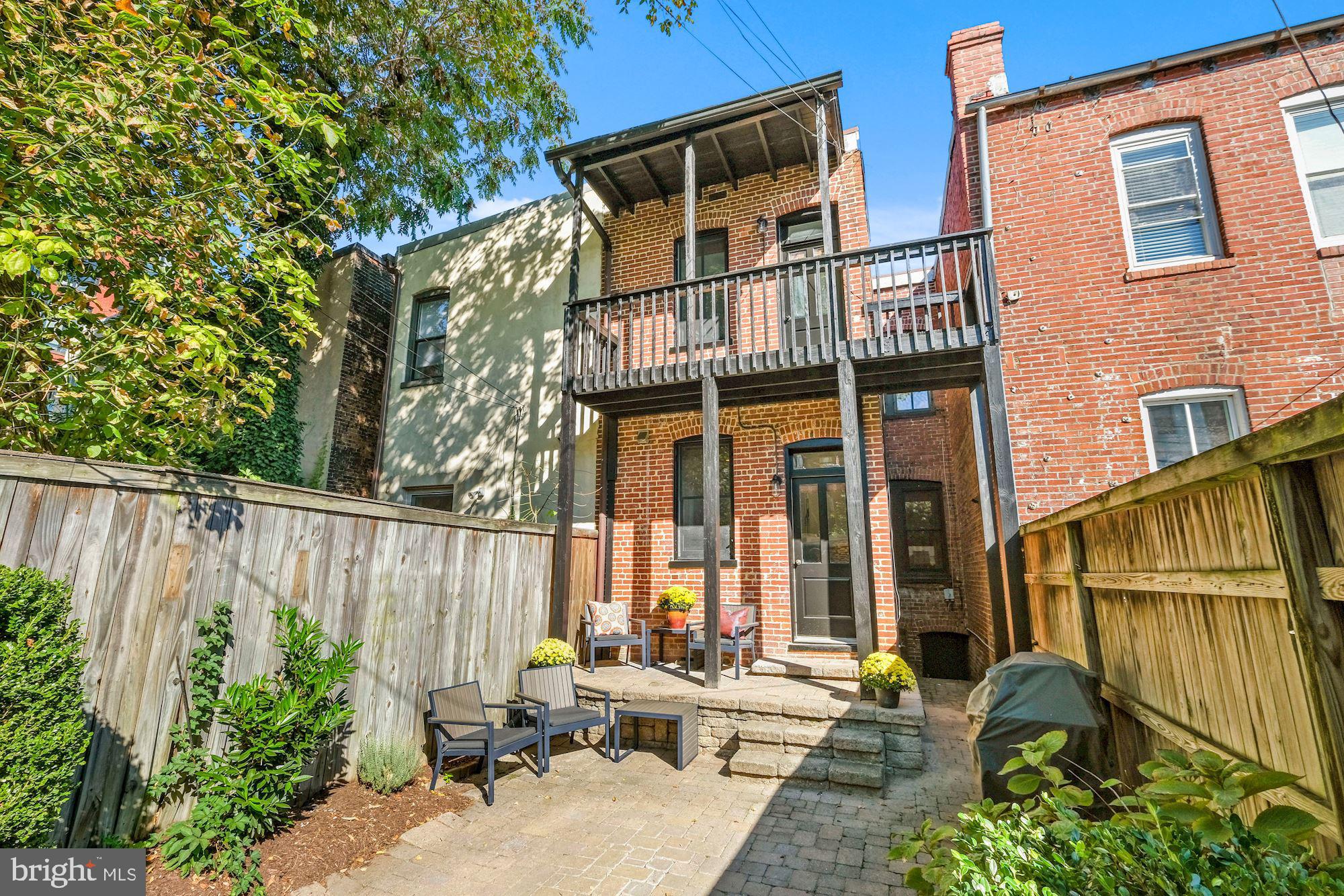 1342 Wallach Place Northwest Washington, DC 20009 - Photo 26 of 36 Back Of House With Balcony On Upper Level