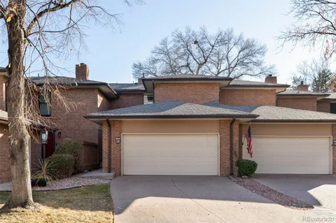 a front view of a house with garage