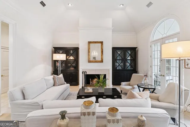 a view of a hallway with windows