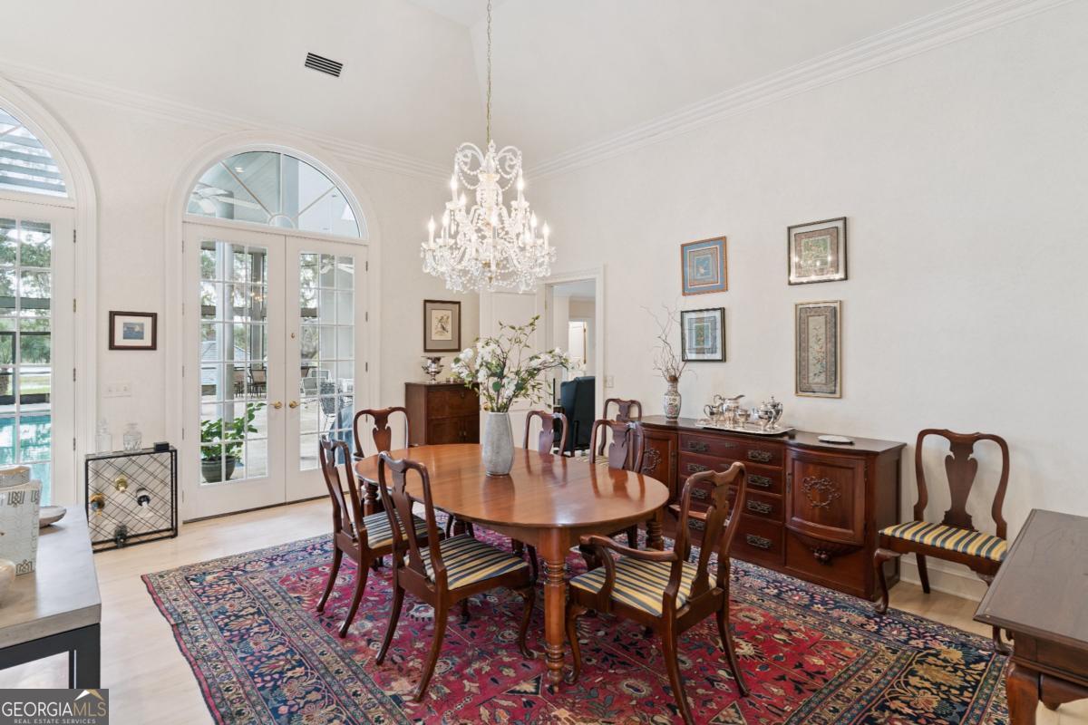 160 Hampton Point Drive St. Simons Island, GA 31522 - Photo 15 of 59 a view of a dining room with furniture