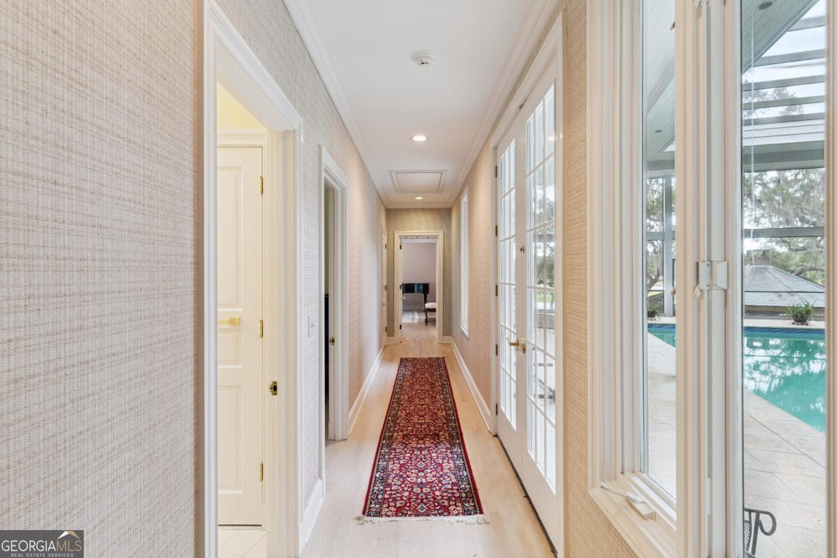 160 Hampton Point Drive St. Simons Island, GA 31522 - Photo 21 of 59 a view of gallery with windows