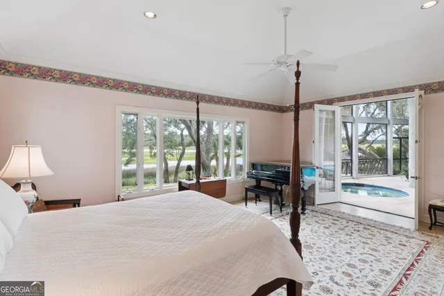 a view of swimming pool with outdoor seating