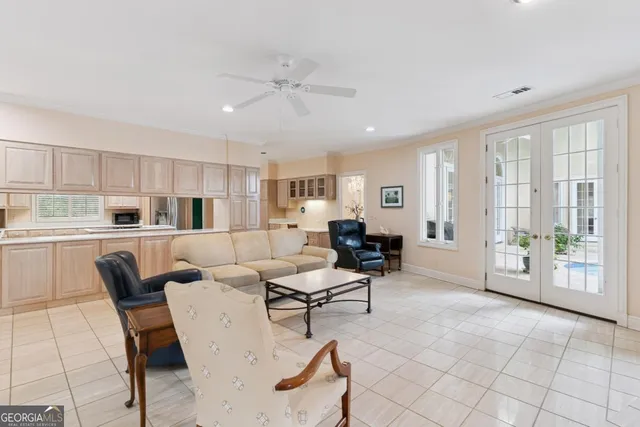 a bed room with a bed and a large window