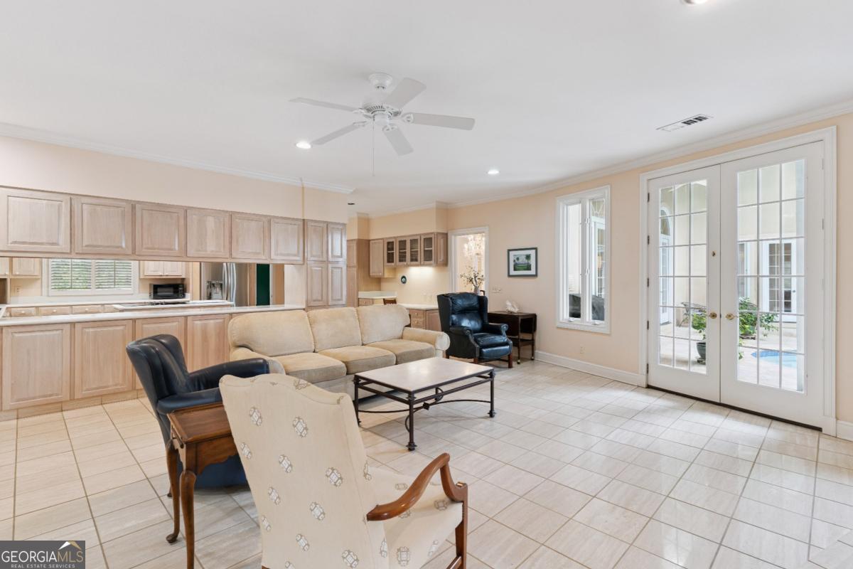 160 Hampton Point Drive St. Simons Island, GA 31522 - Photo 38 of 59 a living room with furniture and kitchen view