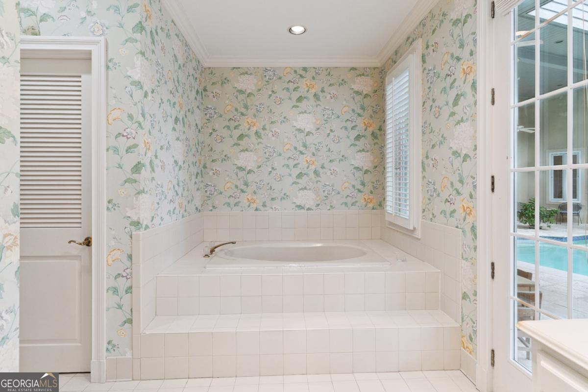 160 Hampton Point Drive St. Simons Island, GA 31522 - Photo 41 of 59 a bathroom with a bathtub and shower