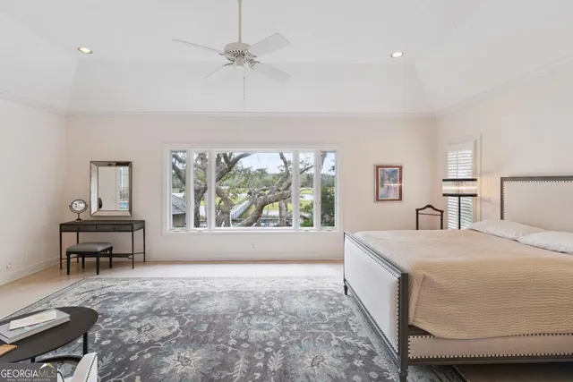 a view of a lake with outdoor seating space