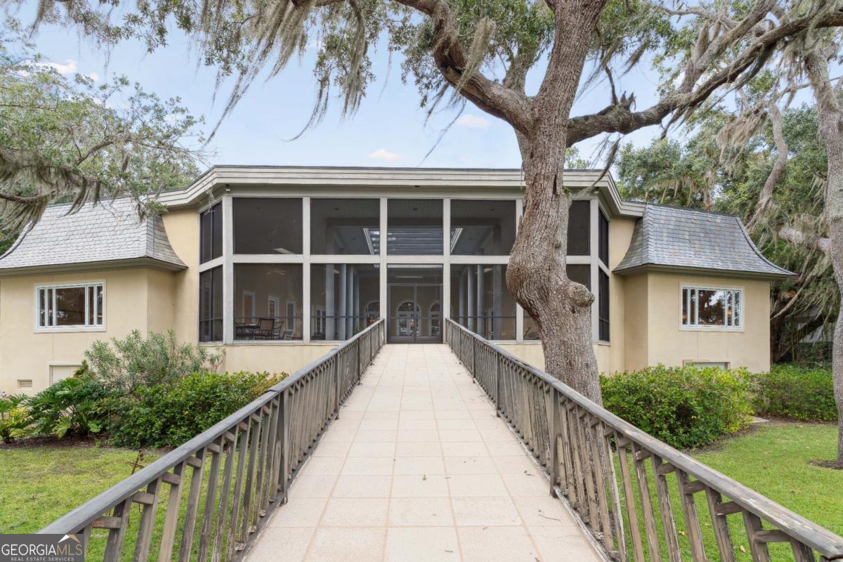160 Hampton Point Drive St. Simons Island, GA 31522 - Photo 47 of 59 a view of a house with wooden fence