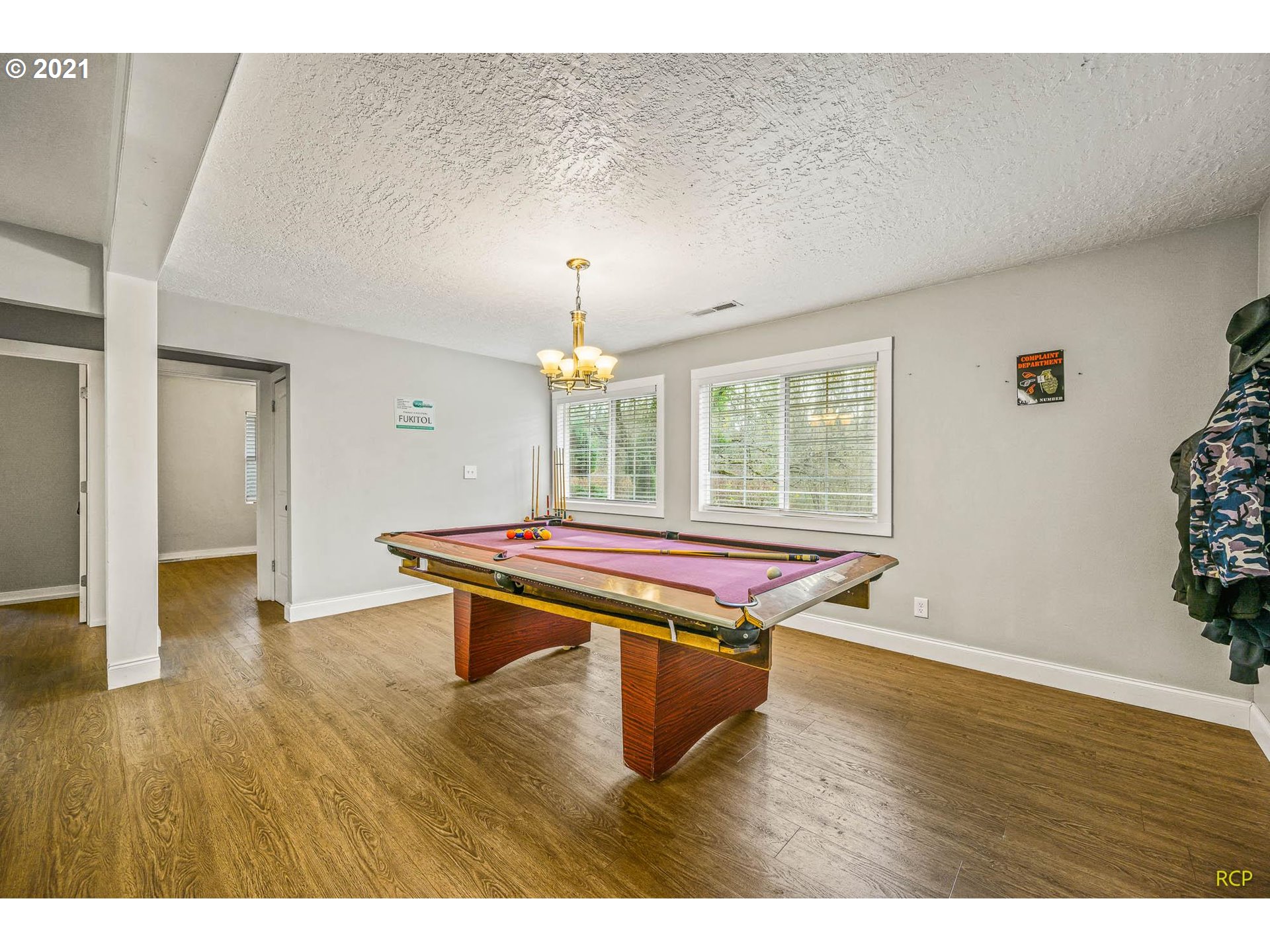 6732 Southeast Telford Road Gresham, OR 97080 - Photo 12 of 27 a room with wooden floor and pool table
