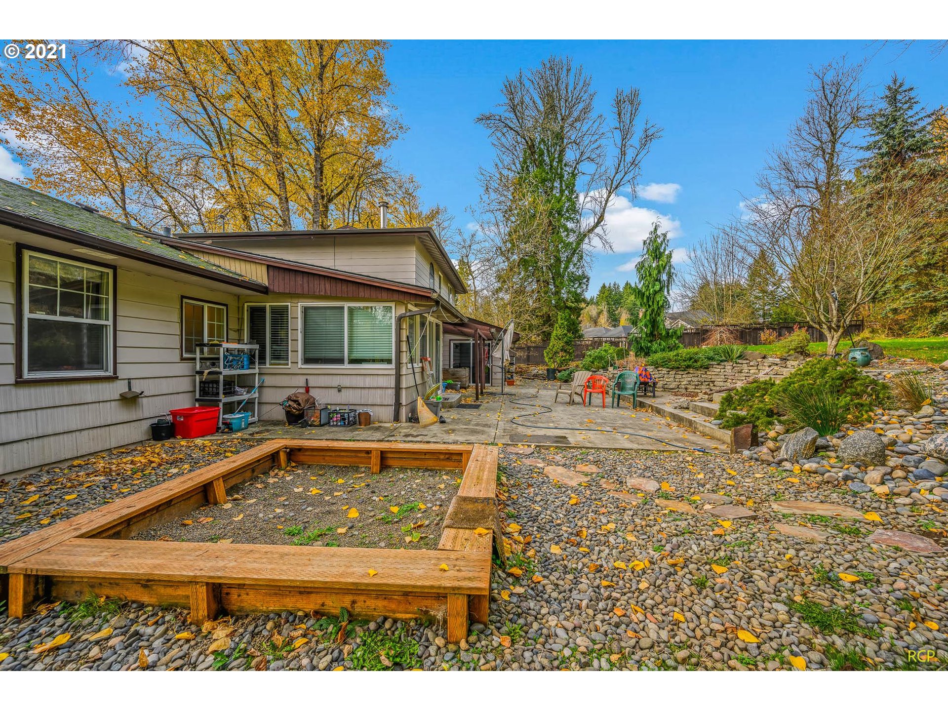 6732 Southeast Telford Road Gresham, OR 97080 - Photo 26 of 27 a view of a house with backyard and sitting area
