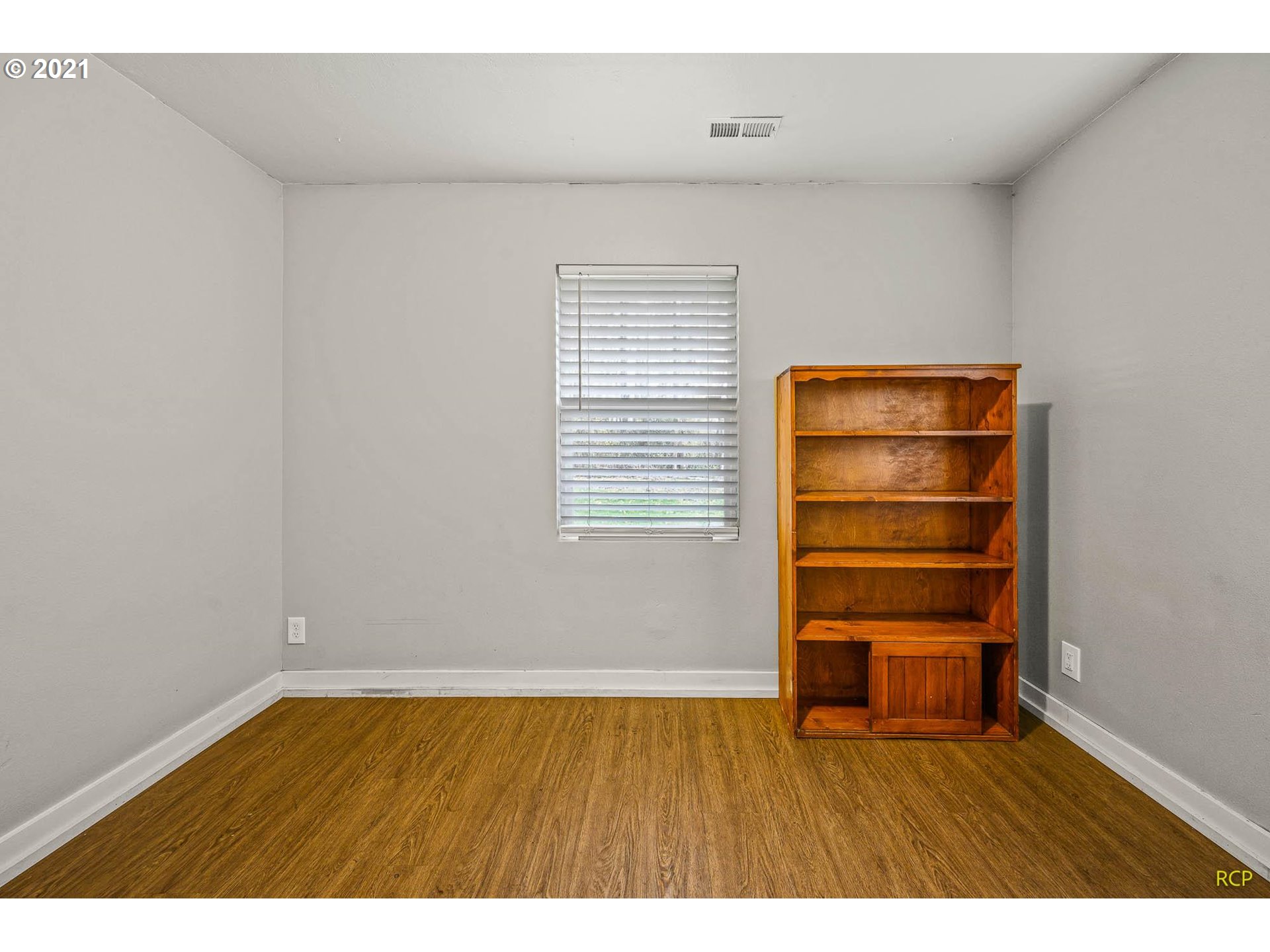 6732 Southeast Telford Road Gresham, OR 97080 - Photo 6 of 27 a view of empty room with wooden floor