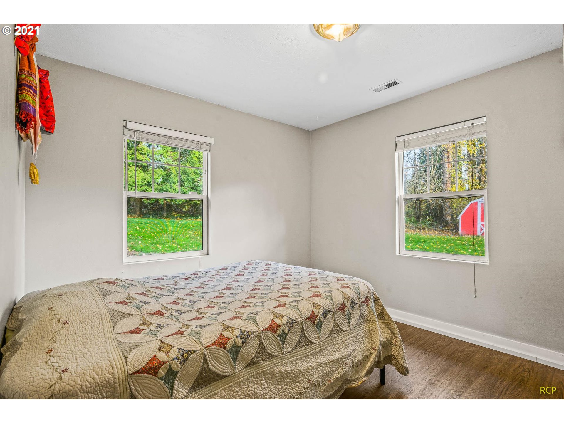 6732 Southeast Telford Road Gresham, OR 97080 - Photo 7 of 27 a bedroom with a bed and a window