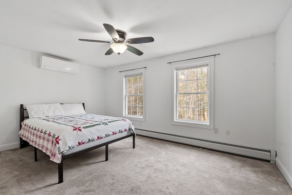 47 Brooks Village Road Phillipston, MA 01331 - Photo 29 of 41 a bedroom with a bed and window