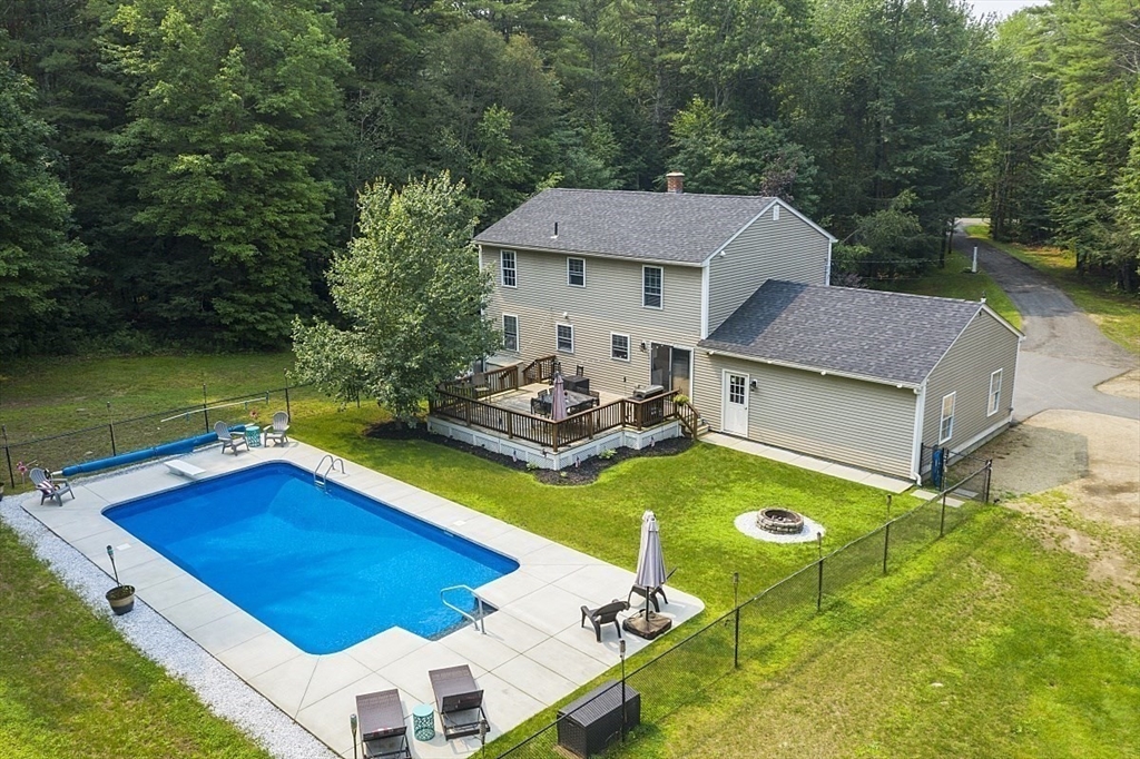 47 Brooks Village Road Phillipston, MA 01331 - Photo 3 of 41 a view of a house with pool and chairs