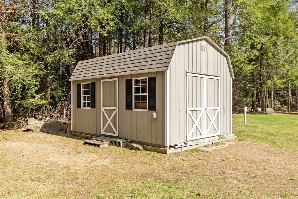 47 Brooks Village Road Phillipston, MA 01331 - Photo 39 of 41 a view of wooden house with a yard