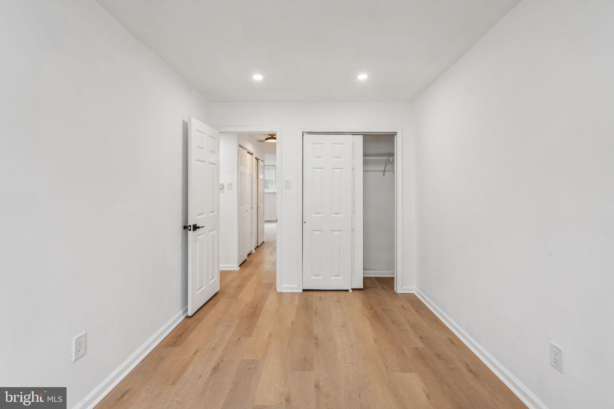 6901 Valley Avenue, Unit D1 Philadelphia, PA 19128 - Photo 15 of 19 a view of hallway with wooden floor