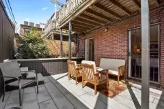 a view of balcony with furniture