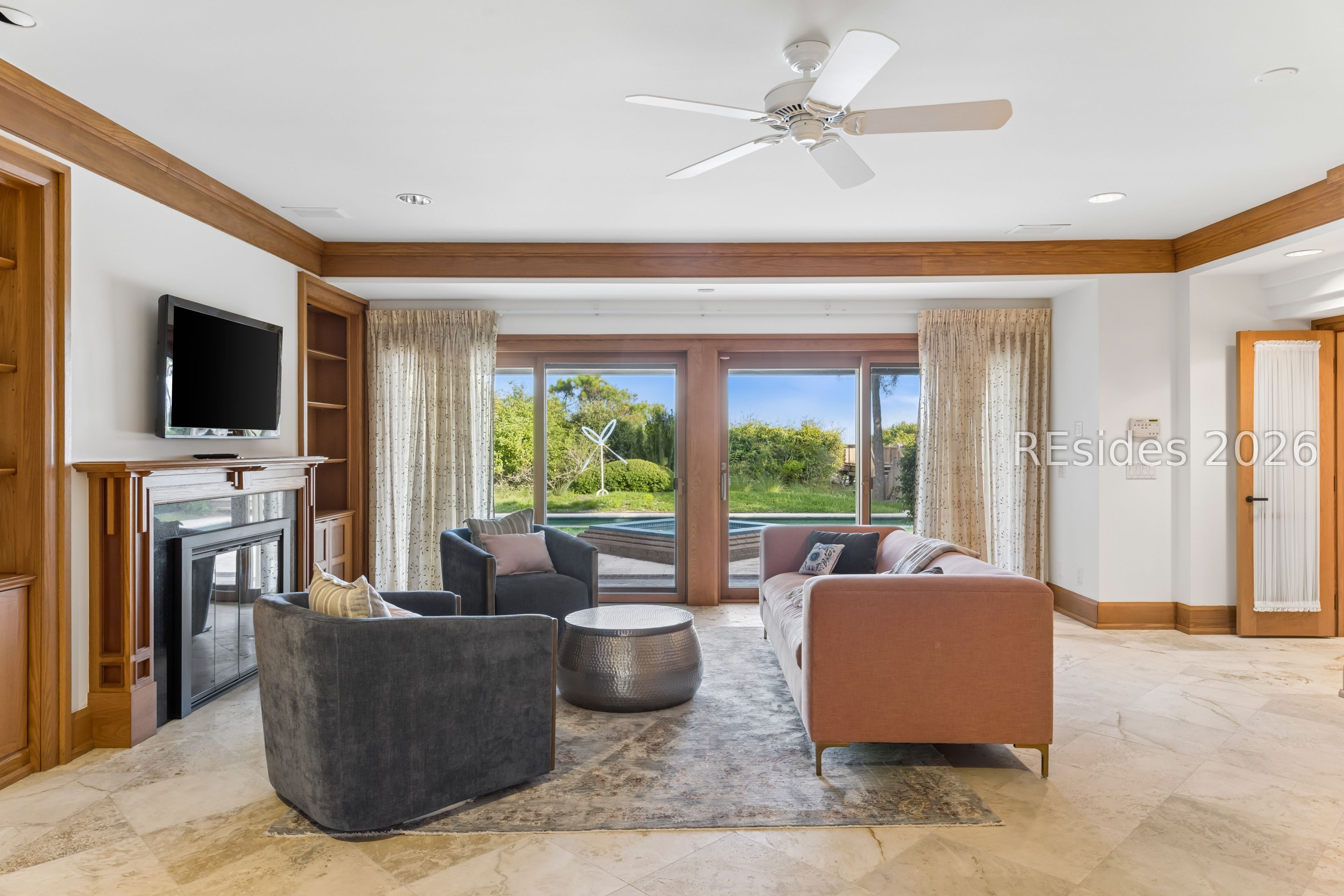 21 Red Cardinal Road Hilton Head Island, SC 29928 - Photo 35 of 54 1st floor Great Room, fireplace, view of pool