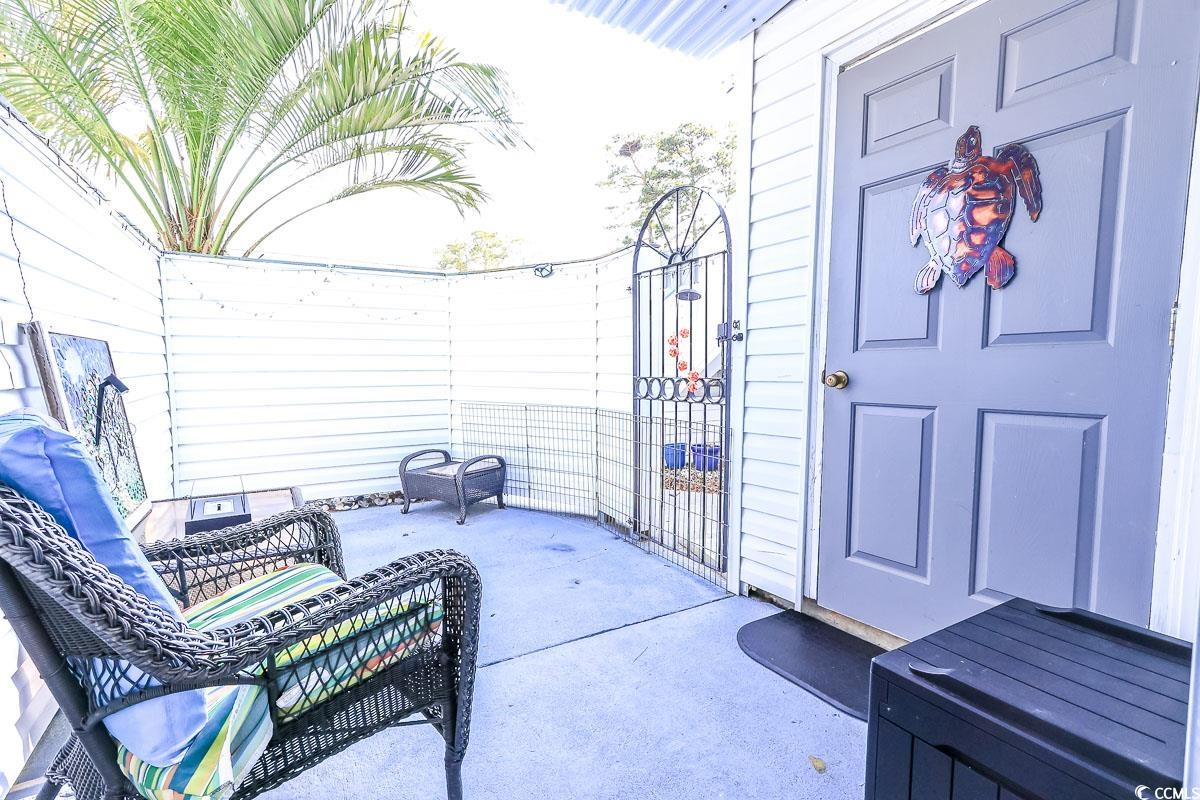 401 Cambridge Circle, Unit A1 Murrells Inlet, SC 29576 - Photo 2 of 15 View of patio