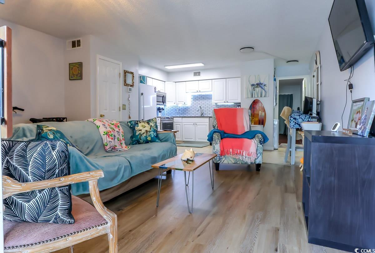 401 Cambridge Circle, Unit A1 Murrells Inlet, SC 29576 - Photo 7 of 15 Bathroom featuring shower / bath combo, vanity, an
