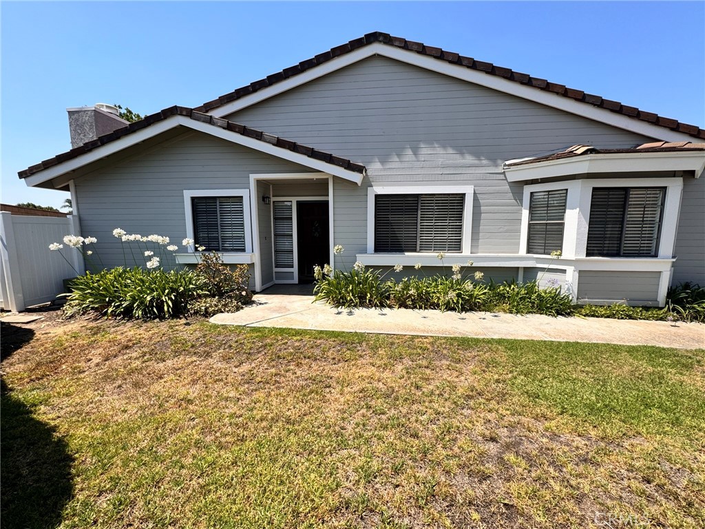 1192 Timbergate Lane, Unit 19 Brea, CA 92821 - Photo 1 of 1 a front view of house with yard and green space