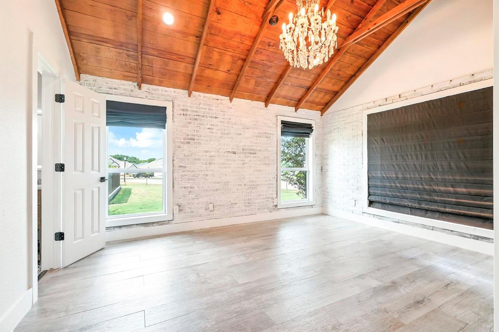 180 East Harpole Road Argyle, TX 76226 - Photo 16 of 38 a view of a room with wooden walls