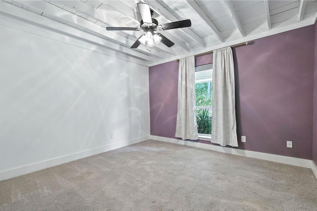 180 East Harpole Road Argyle, TX 76226 - Photo 22 of 38 an empty room with windows and fan