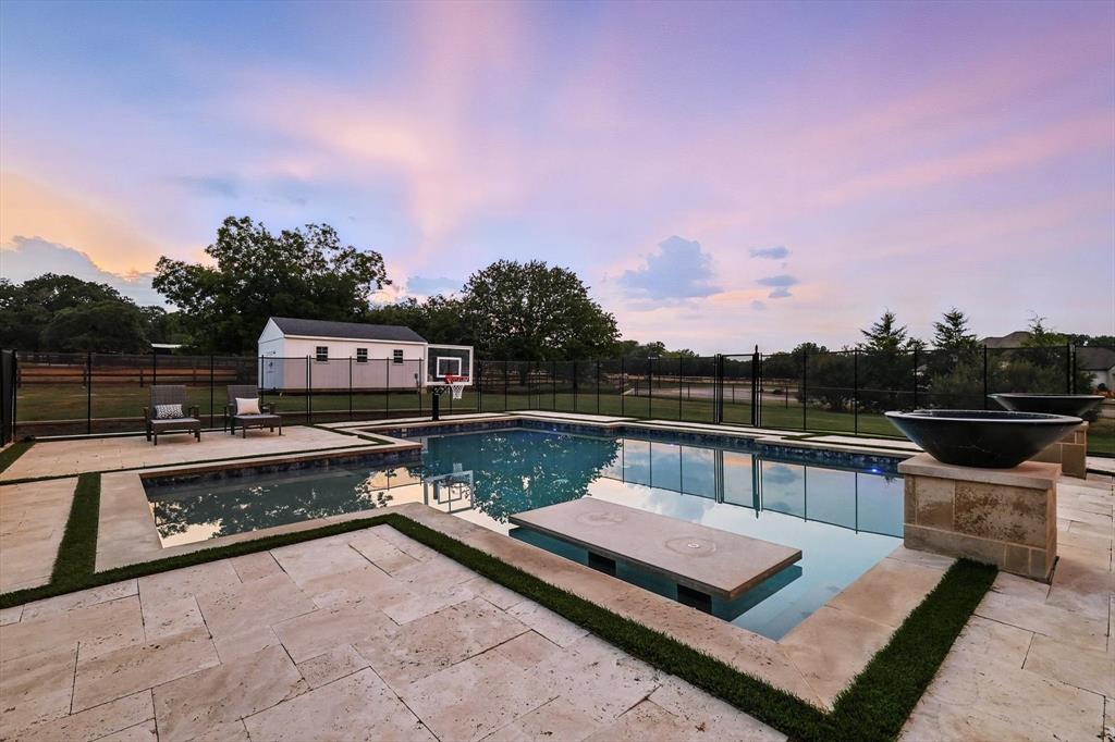 180 East Harpole Road Argyle, TX 76226 - Photo 31 of 38 a terrace with a table and chairs