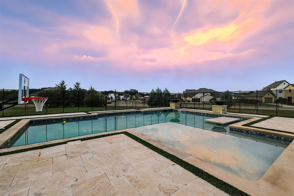 180 East Harpole Road Argyle, TX 76226 - Photo 33 of 38 a view of a lake with a terrace