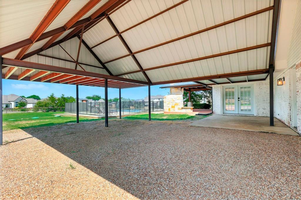 180 East Harpole Road Argyle, TX 76226 - Photo 37 of 38 a view of a house with a backyard