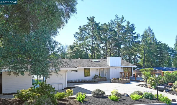front view of a house with a small yard