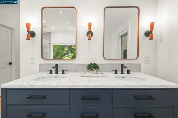 a front view of house with yard and swimming pool