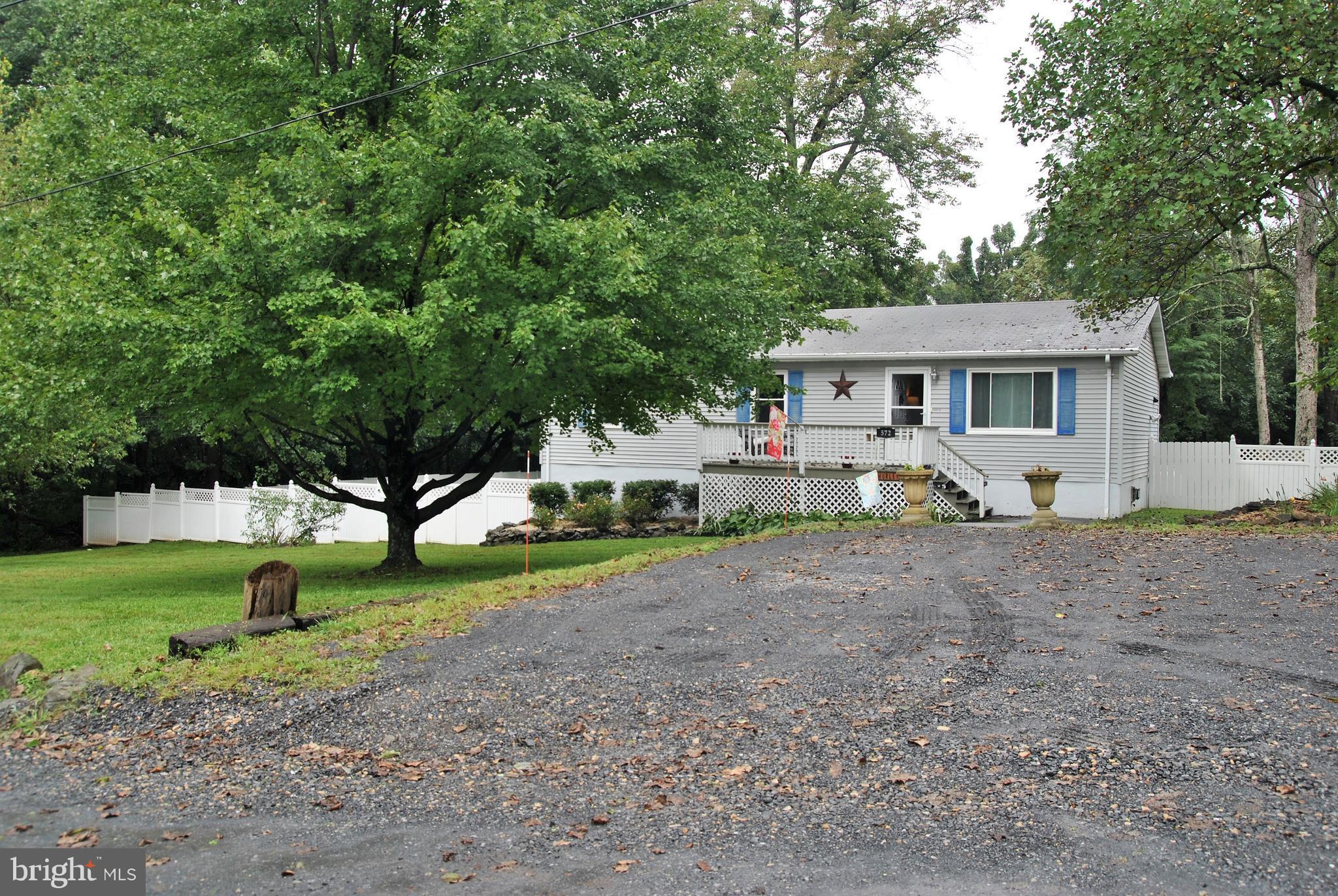 572 Highridge Road Front Royal, VA 22630 - Photo 2 of 26 a view of outdoor space with tree s