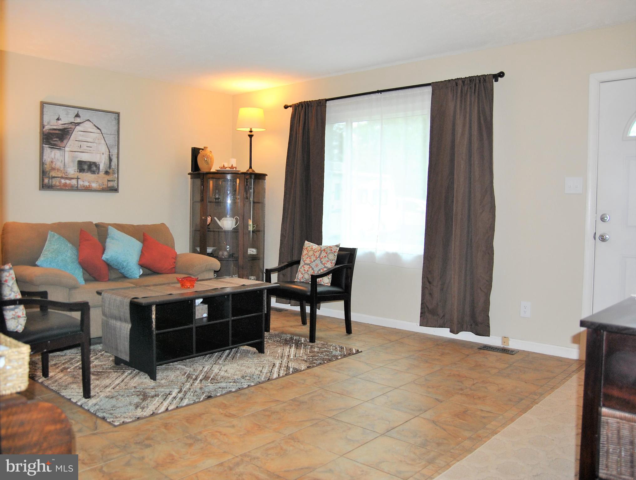 572 Highridge Road Front Royal, VA 22630 - Photo 5 of 26 a living room with furniture and a window
