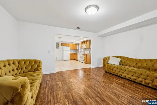 a bedroom with a bed and couch