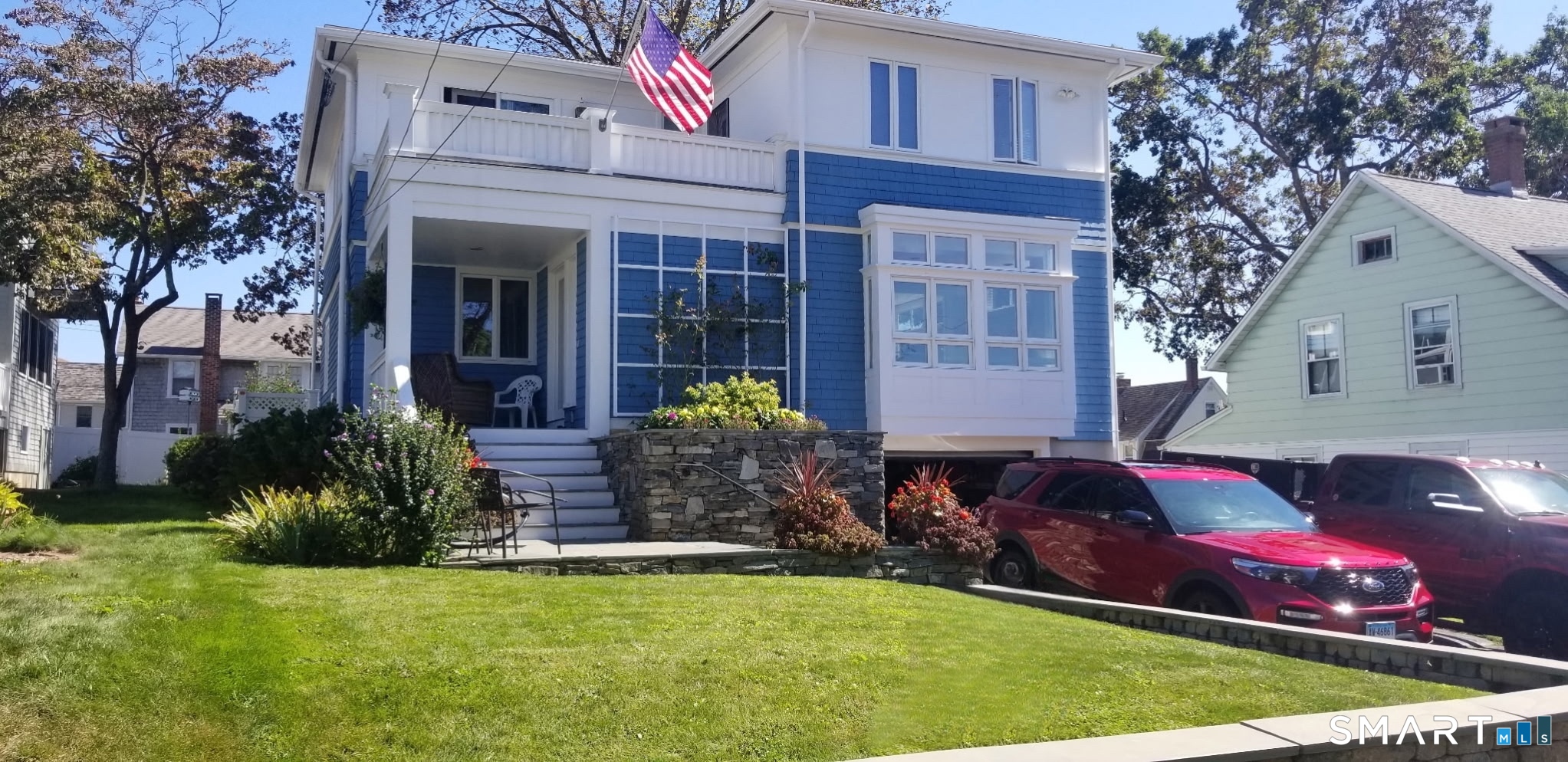 19 2nd Avenue Branford, CT 06405 - Photo 1 of 10 a front view of house with yard and outdoor seating