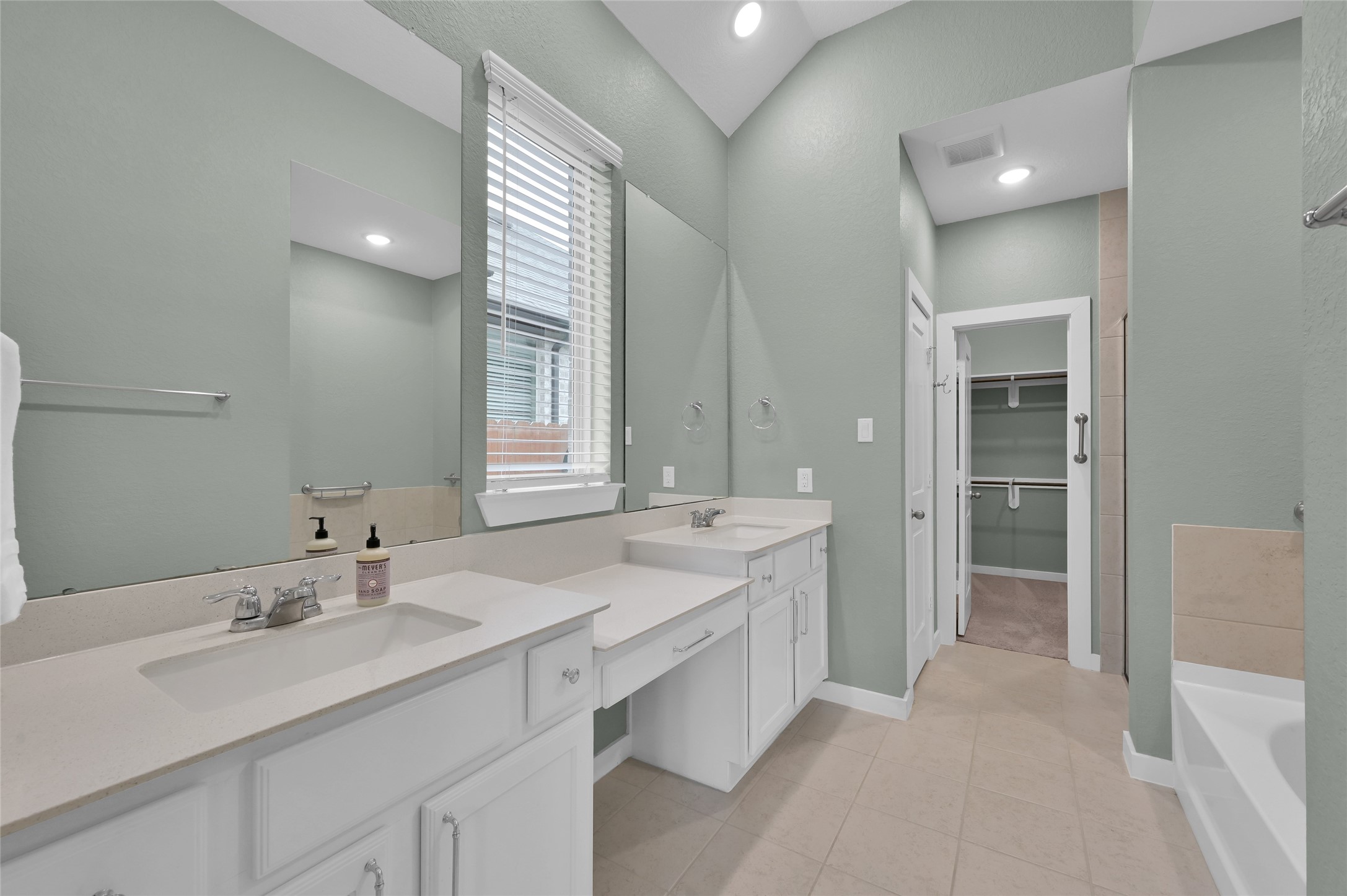 14960 Scarlet Branch Drive Conroe, TX 77302 - Photo 22 of 50 a bathroom with a double vanity sink mirror and double