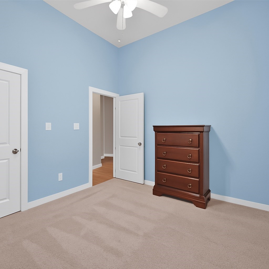 14960 Scarlet Branch Drive Conroe, TX 77302 - Photo 28 of 50 a view of room with furniture and a ceiling fan