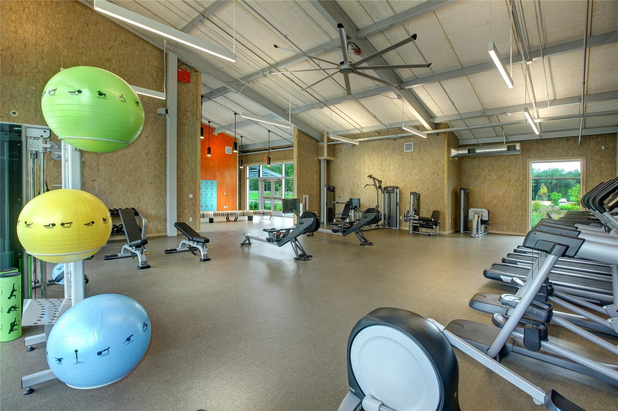 14960 Scarlet Branch Drive Conroe, TX 77302 - Photo 48 of 50 Stay active year-round in this spacious and modern community gym, featuring a variety of high-end workout equipment to support every fitness goal.