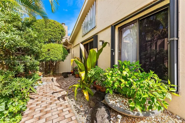 a spacious bedroom with a bed and a couch
