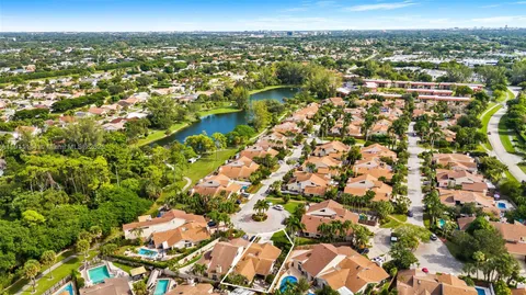 an aerial view of residential house with an outdoor space