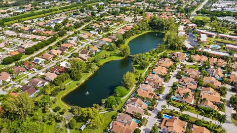 an aerial view of a house with a garden