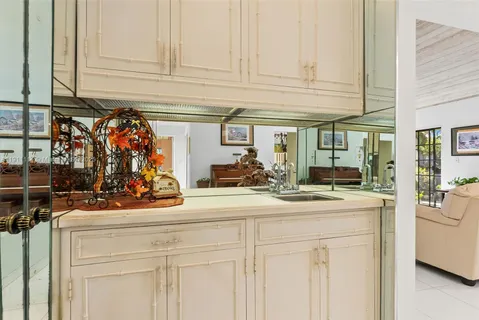 a view of a kitchen with appliances