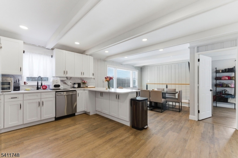 26 Union Road Wantage, NJ 07461 - Photo 12 of 26 a kitchen with cabinets and wooden floor