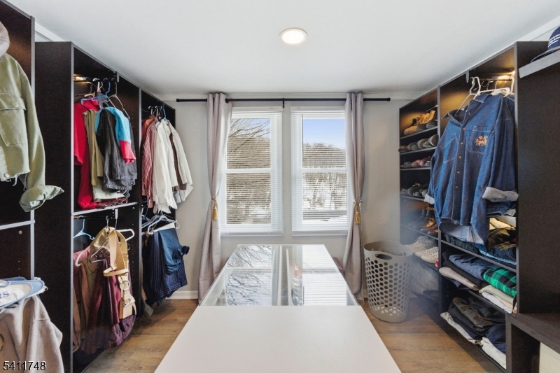 26 Union Road Wantage, NJ 07461 - Photo 15 of 26 a view of walk in closet with clothes and shoes