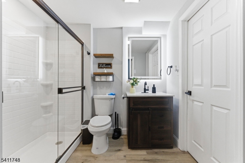 26 Union Road Wantage, NJ 07461 - Photo 4 of 26 a bathroom with a sink a toilet and shower