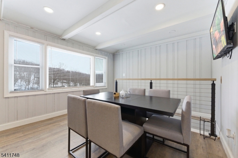 26 Union Road Wantage, NJ 07461 - Photo 10 of 26 a kitchen with a table chairs sink and cabinets
