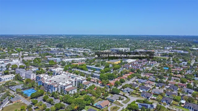 an aerial view of a city with lots of residential buildings