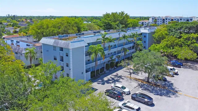 an aerial view of a house with a garden
