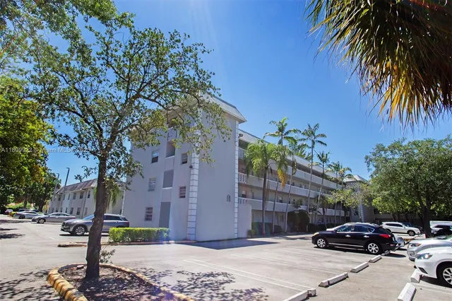 a view of street with parked cars